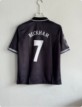 MANCHESTER UNITED 1997 BLACK KIT FIVESLEEVE POLO